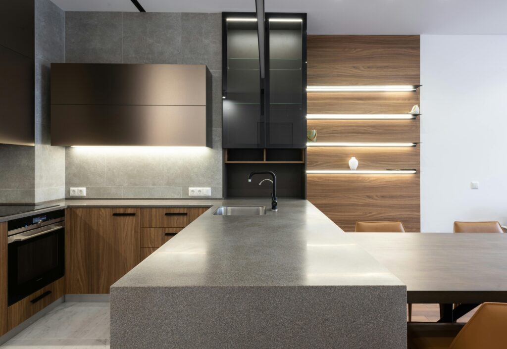 Modern Kitchen Sinks And with a stainless-steel sink and sleek countertops.