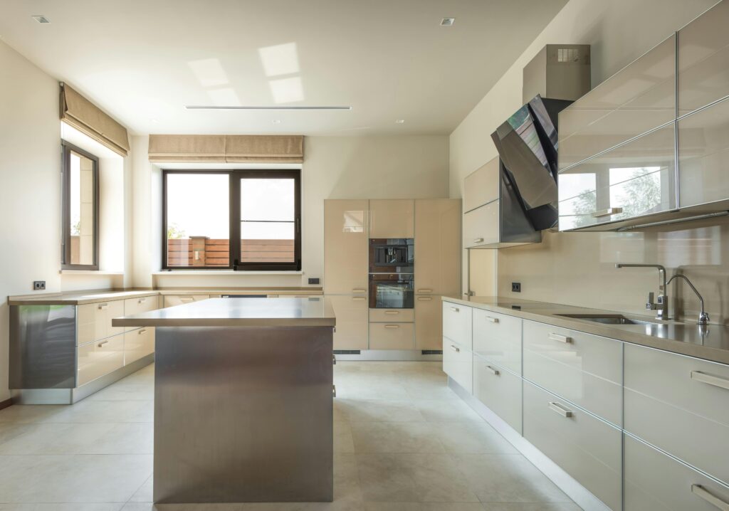 A contemporary kitchen with polished porcelain tile flooring that adds a clean, modern touch.