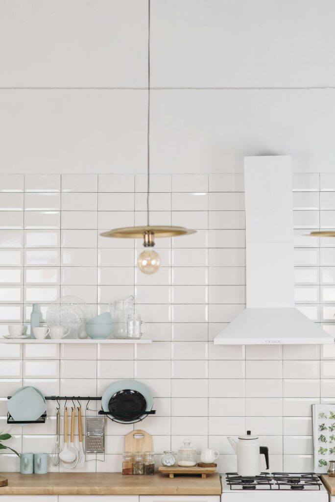 Removable wall tiles installed as a backsplash in a kitchen, Peel and Stick Tile.