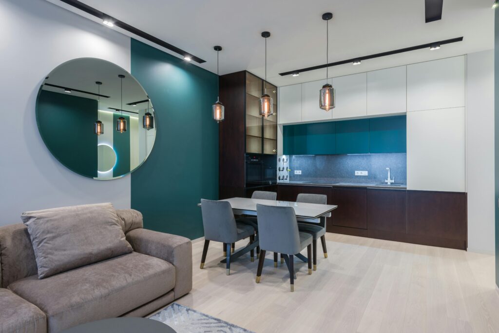A modern kitchen with energy-efficient LED lights installed on the ceiling and under cabinets.