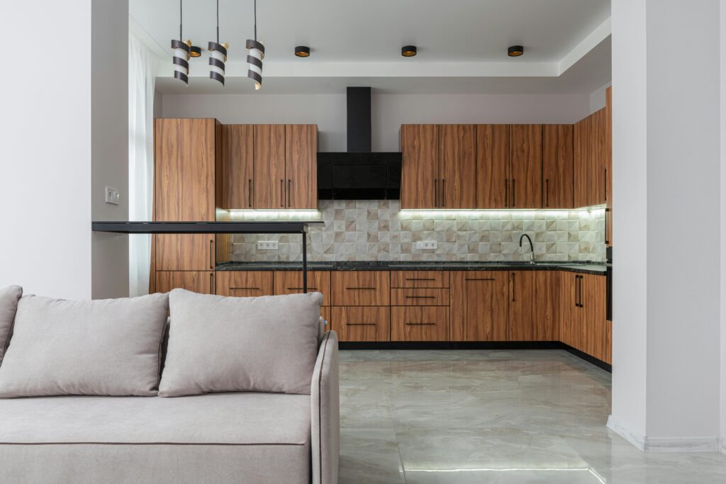 Under-cabinet lighting providing task lighting over kitchen counters for cooking and meal prep.