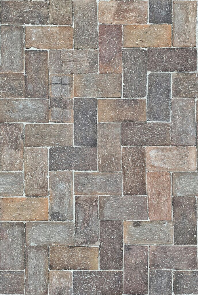 Vertical display of wall tiles and Dal Tile Showroom in a variety of textures and finishes.